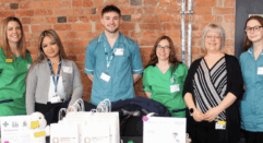 Careers event - people standing behind a display table